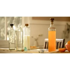 Drop Glass Water Bottle With Ceramic Stopper-750 ML -House Furnish World GUEST 9459e3e8 5091 4ec6 80ae 13141a306476